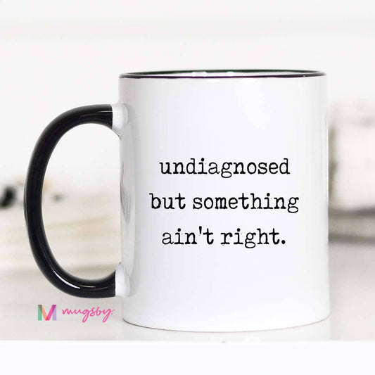 Mugsby Funny Coffee Mug – Undiagnosed But Something Ain’t Right