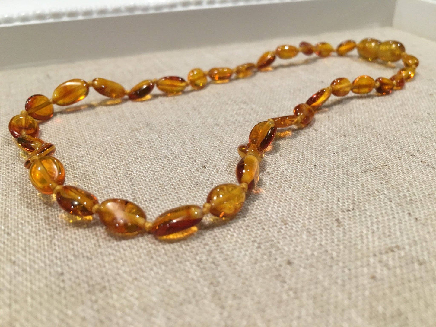 Baltic Essentials Polished Honey Bean 11 Baltic Amber Necklace teething fever fussiness