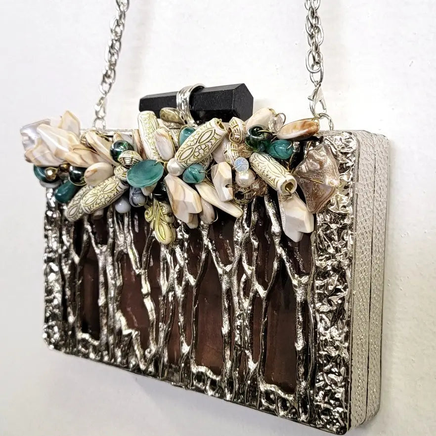 A Jeweled Metal Mixed-Stone Clutch